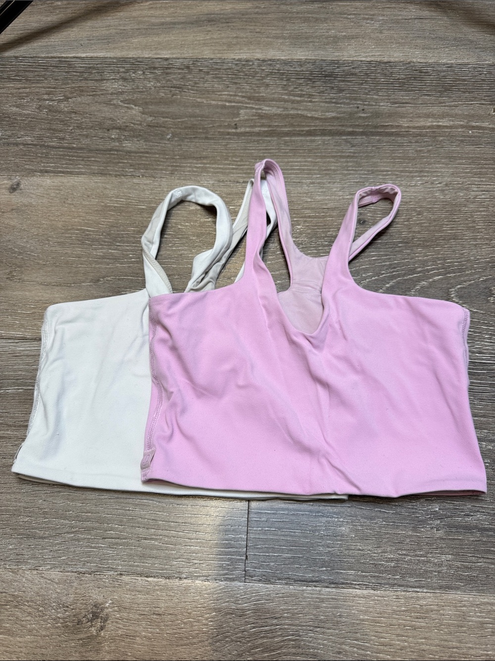 Two lululemon athletica Scoop-Back Bralettes in Pink & Cream AZ1354